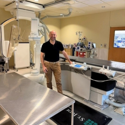 Photo of Dr. Gharib in clinical setting.