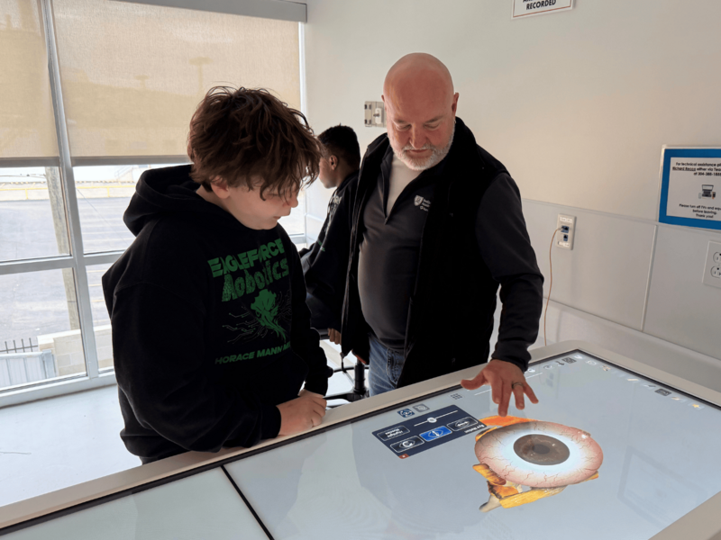 Student studying Anatomage table
