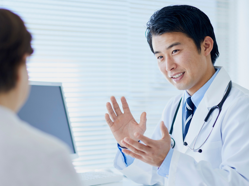 Doctor speaking with patient