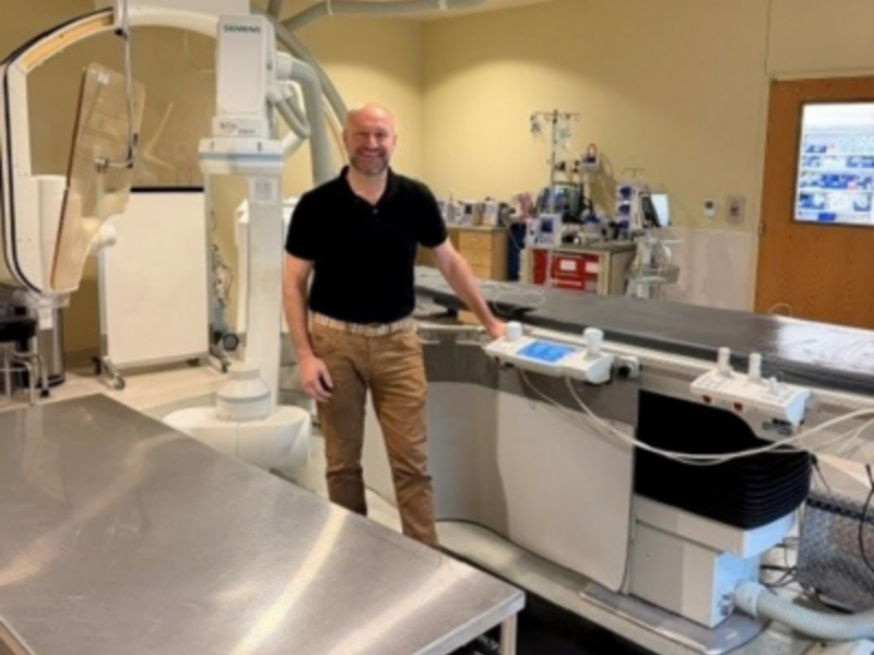 Dr. Gharib standing in clinical environment