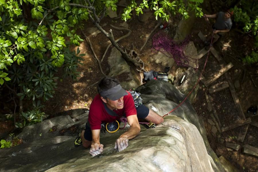 a man rock climbing