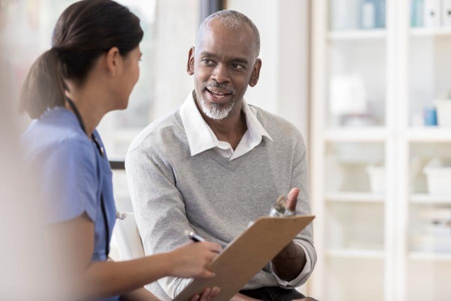 Nurse talking with patient