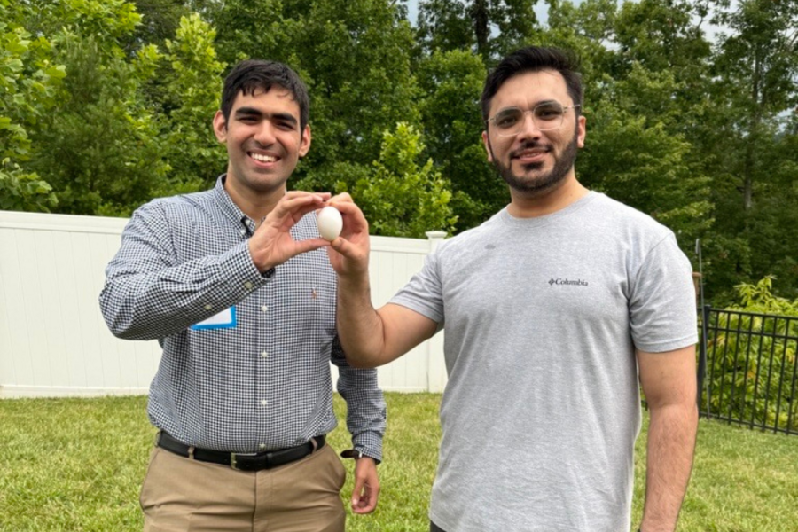 Internal Medicine residents holding egg