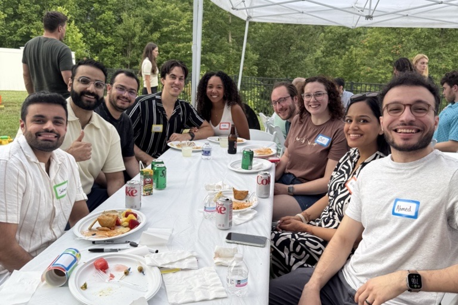 Internal Medicine residents eating lunch outdoors.
