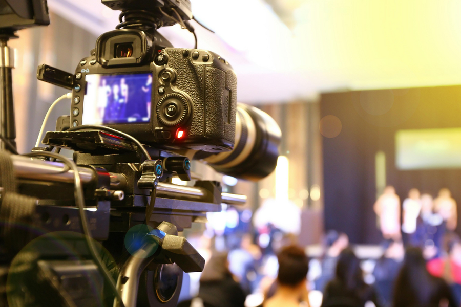 image of camera recording presentation