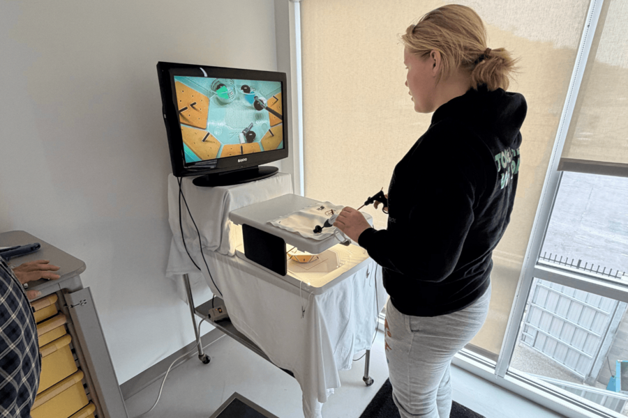 Student exploring simulation technology