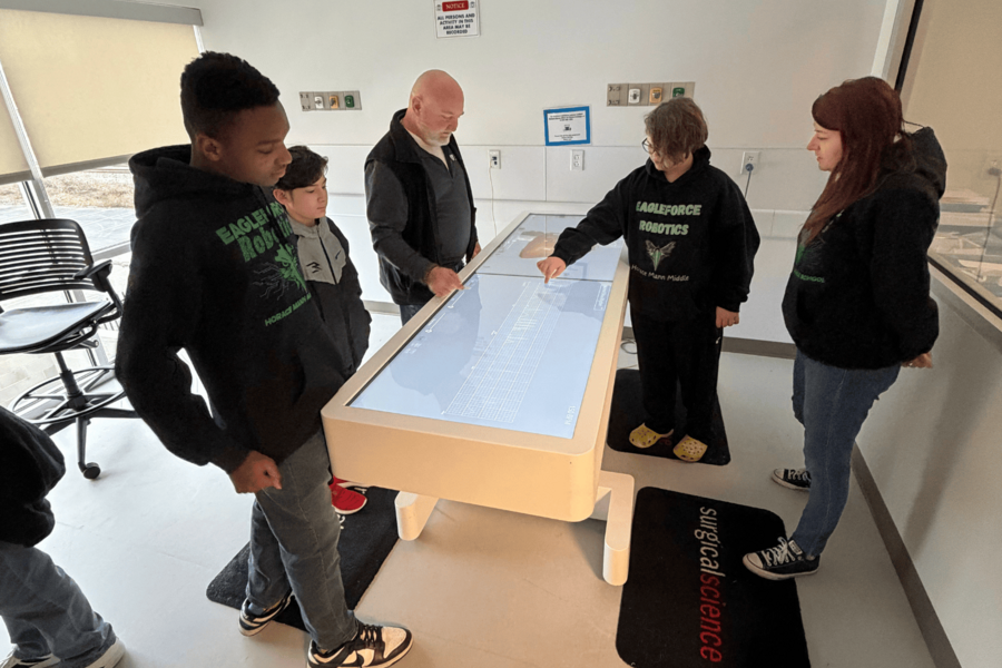 Students exploring Anatomage table