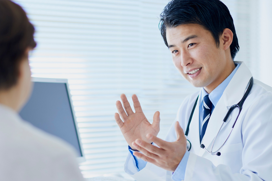 Doctor speaking with patient