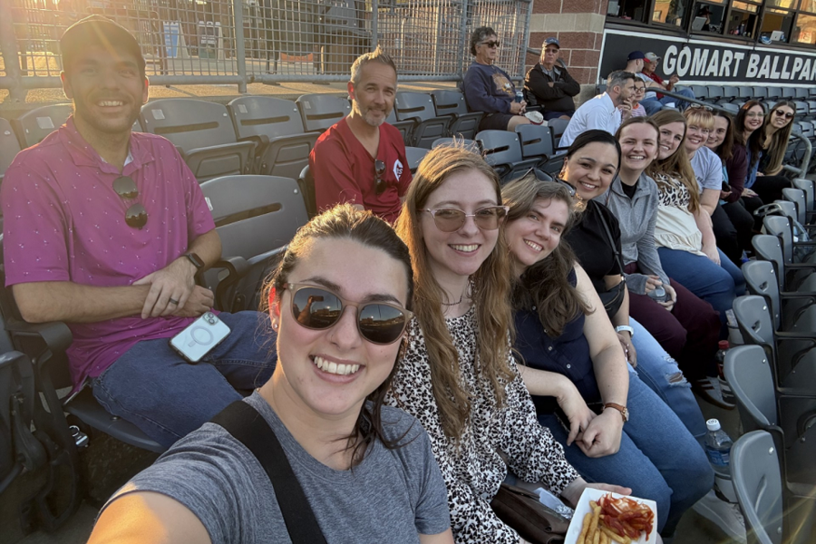 Interns smile for group selfie at Charleston Dirty Birds baseball game