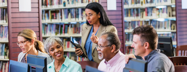 Faculty class in library