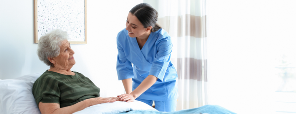 Caregiver at patient's bedside