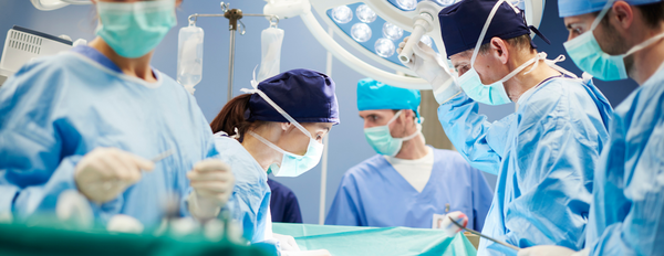 Doctors engaging in procedure