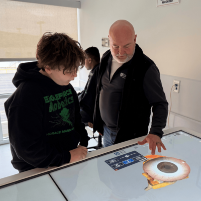 Student studying Anatomage table